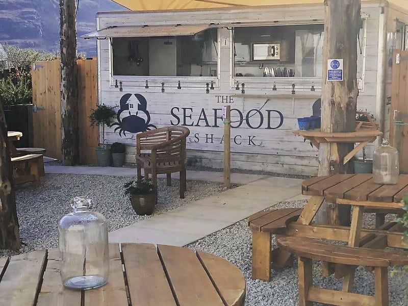The Seafood Shack is located in Ullapool, Highlands & Islands. The Good Food Guide says: “Hand-dived scallops with herb butter, creel-caught langoustines with hot garlic and thyme butter, hot-smoked trout from the Ullapool Smokehouse, and a tempura-battered haddock wrap that’s fast achieving cult status are typical examples from a daily changing menu that's in tune with the catch from the inshore boats.”